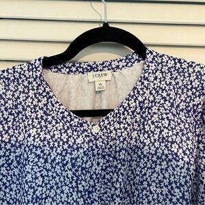 J. Crew blouse with tiny flower print and ruffled sleeves.